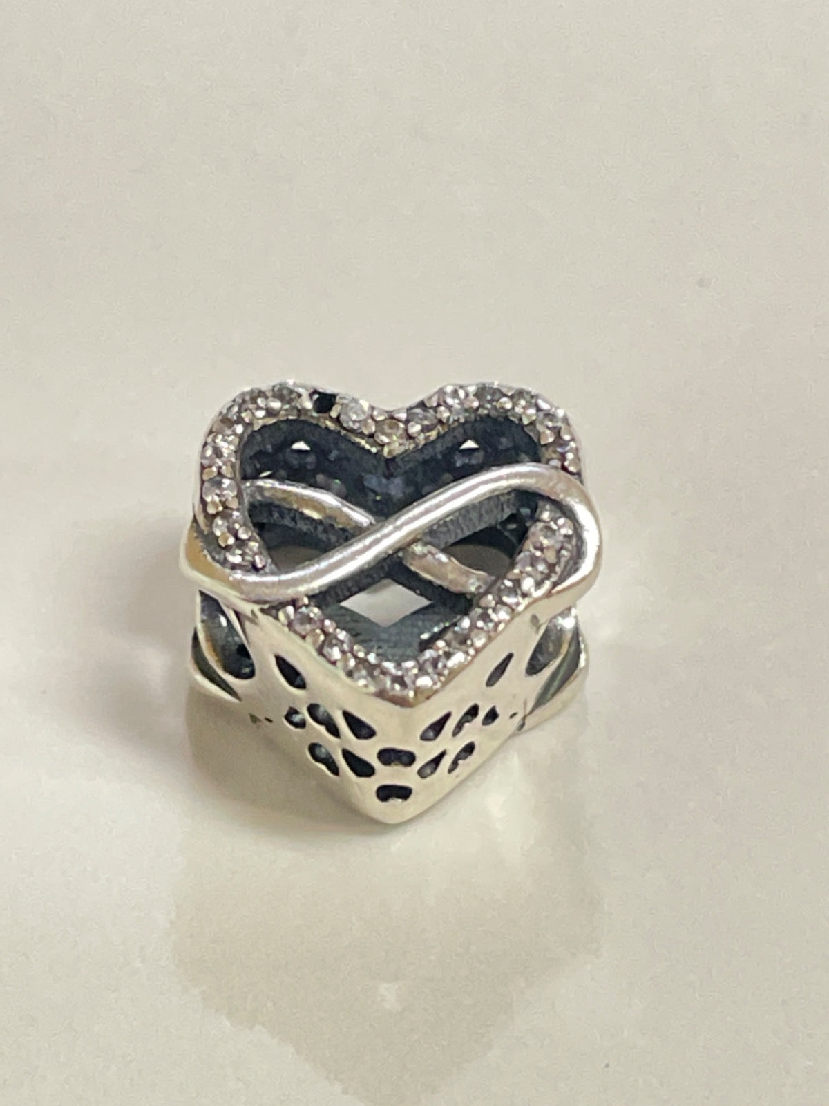 White Silver Herat Infinity Charm with CZ