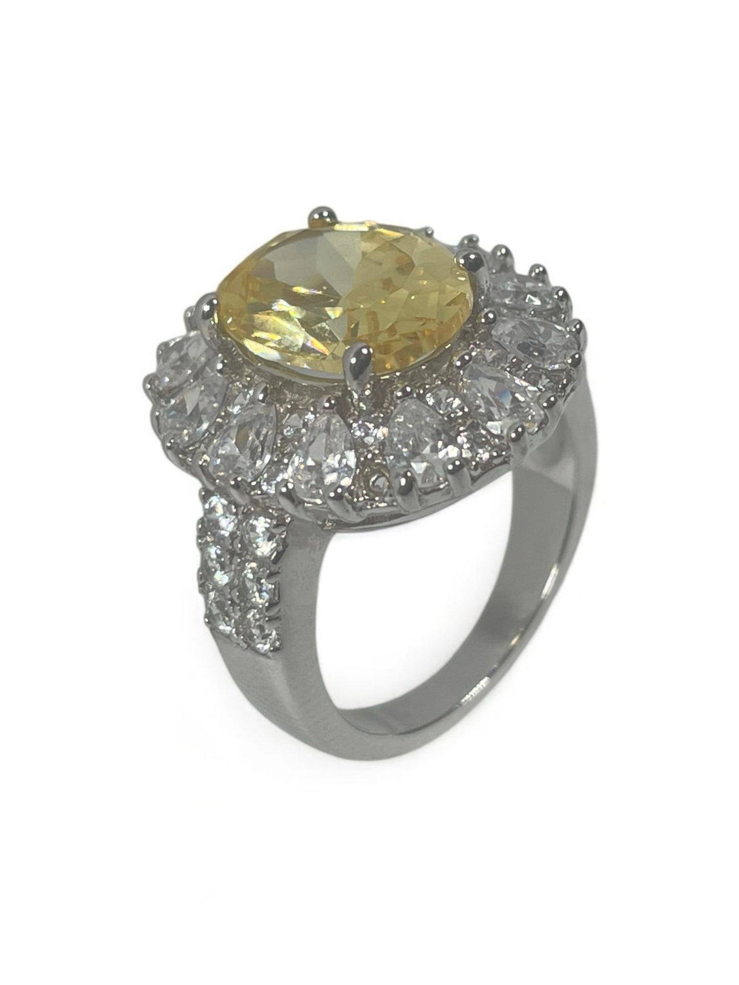 Silver Ring with CZ and with a yellow stone.