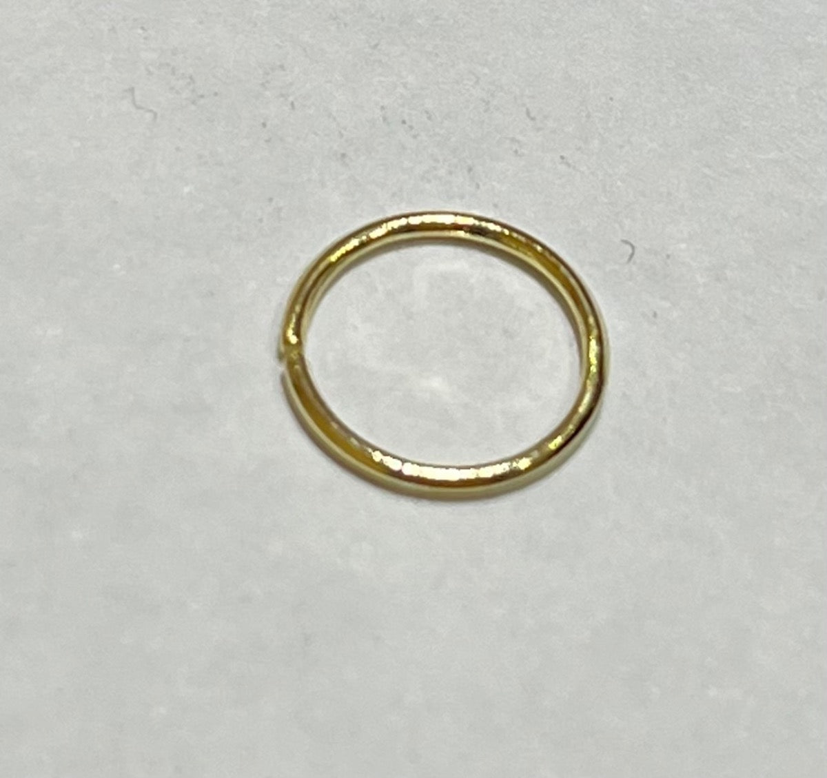 18K Yellow Gold Hoop Nose Piercing