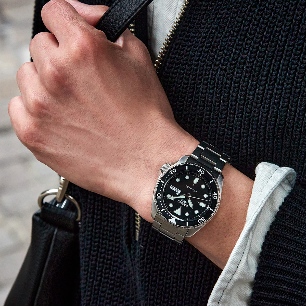 Seiko SRPD55 men's automatic watch with a black dial and stainless steel case and bracelet. — lifestyle