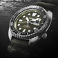 Seiko Prospex SRPE05 men's green dial automatic watch with khaki silicone strap — lifestyle