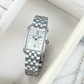 Seiko SWR091 women's Essentials watch with a rectangular stainless steel case and silver dial. — lifestyle